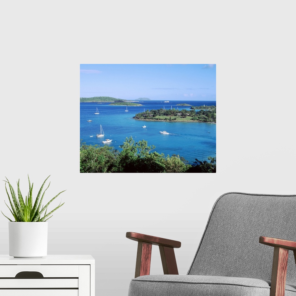 A modern room featuring Large photo on canvas of sail boats in a bay in the ocean.
