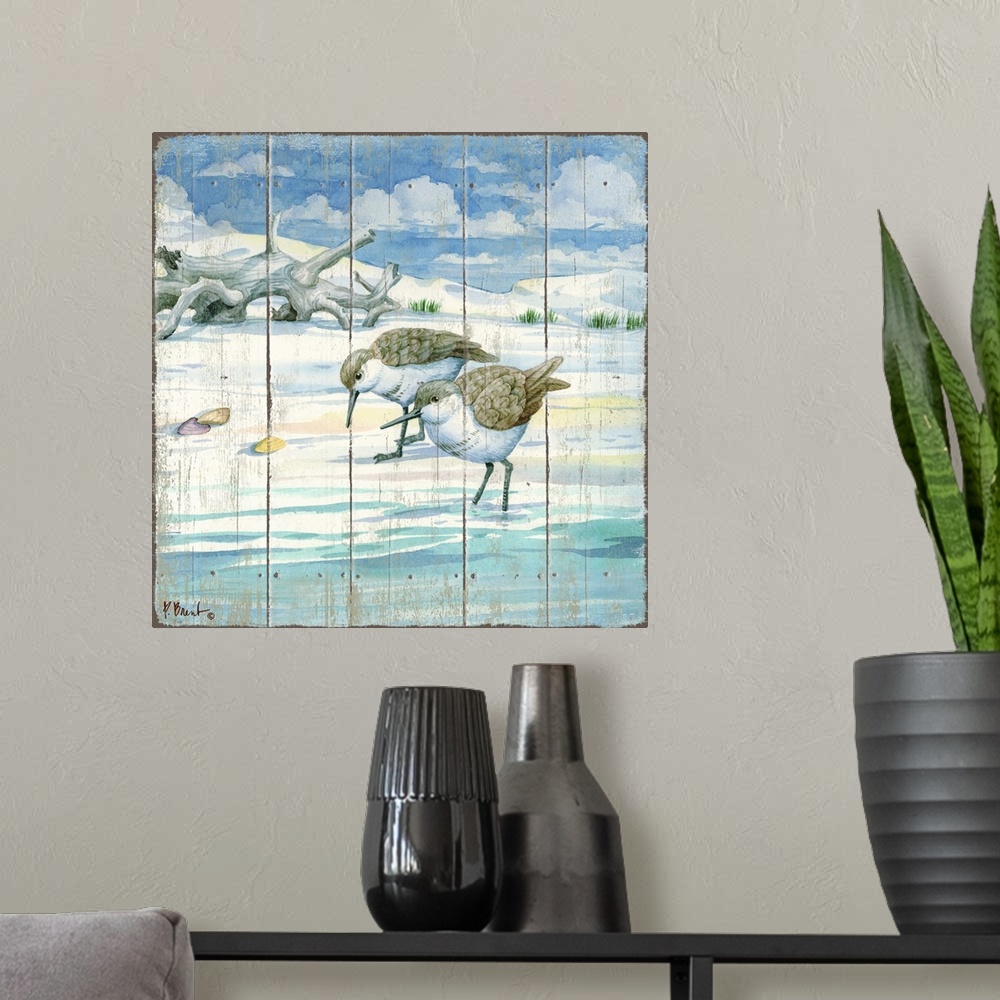 A modern room featuring Square painting on a faux wood background of two sandpipers grazing on the shore with driftwood i...