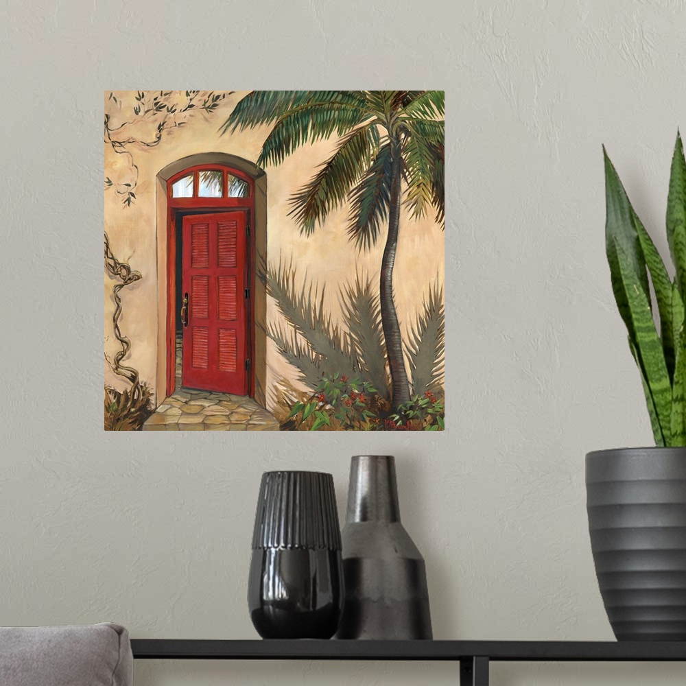 A modern room featuring Painting of a red door in an adobe building with a palm tree.