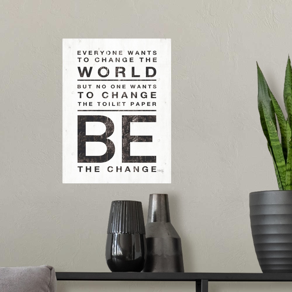 A modern room featuring Everyone Wants to Change the World
