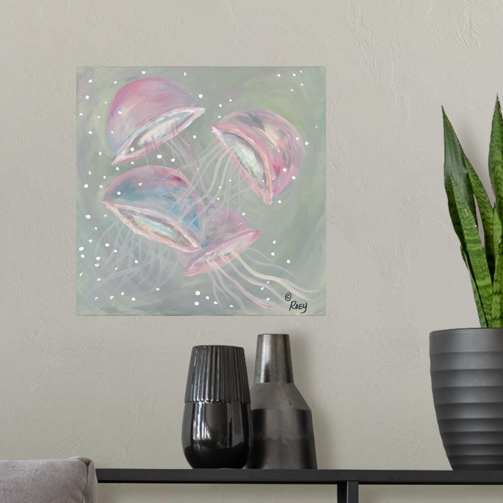 A modern room featuring Square abstract painting of four pink jellyfish.