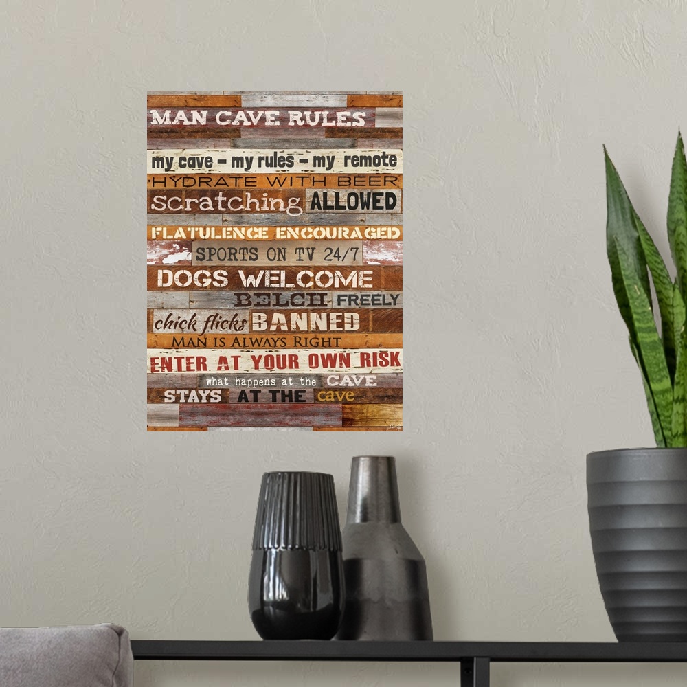 A modern room featuring Typography artwork of man cave rules, with text against a wooden background.