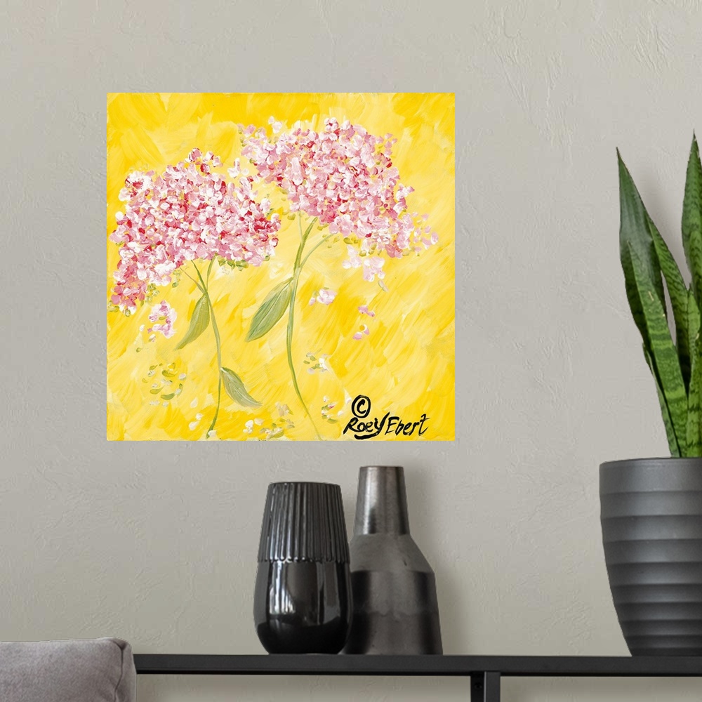 A modern room featuring Square contemporary painting of Pink Hydrangeas against a bright yellow background.