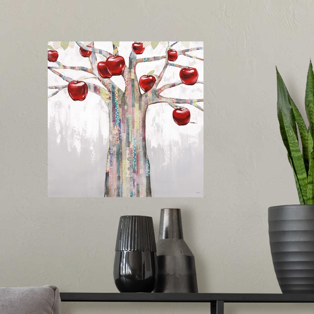A modern room featuring Contemporary painting of a tree with bright red apples hanging form the branches.