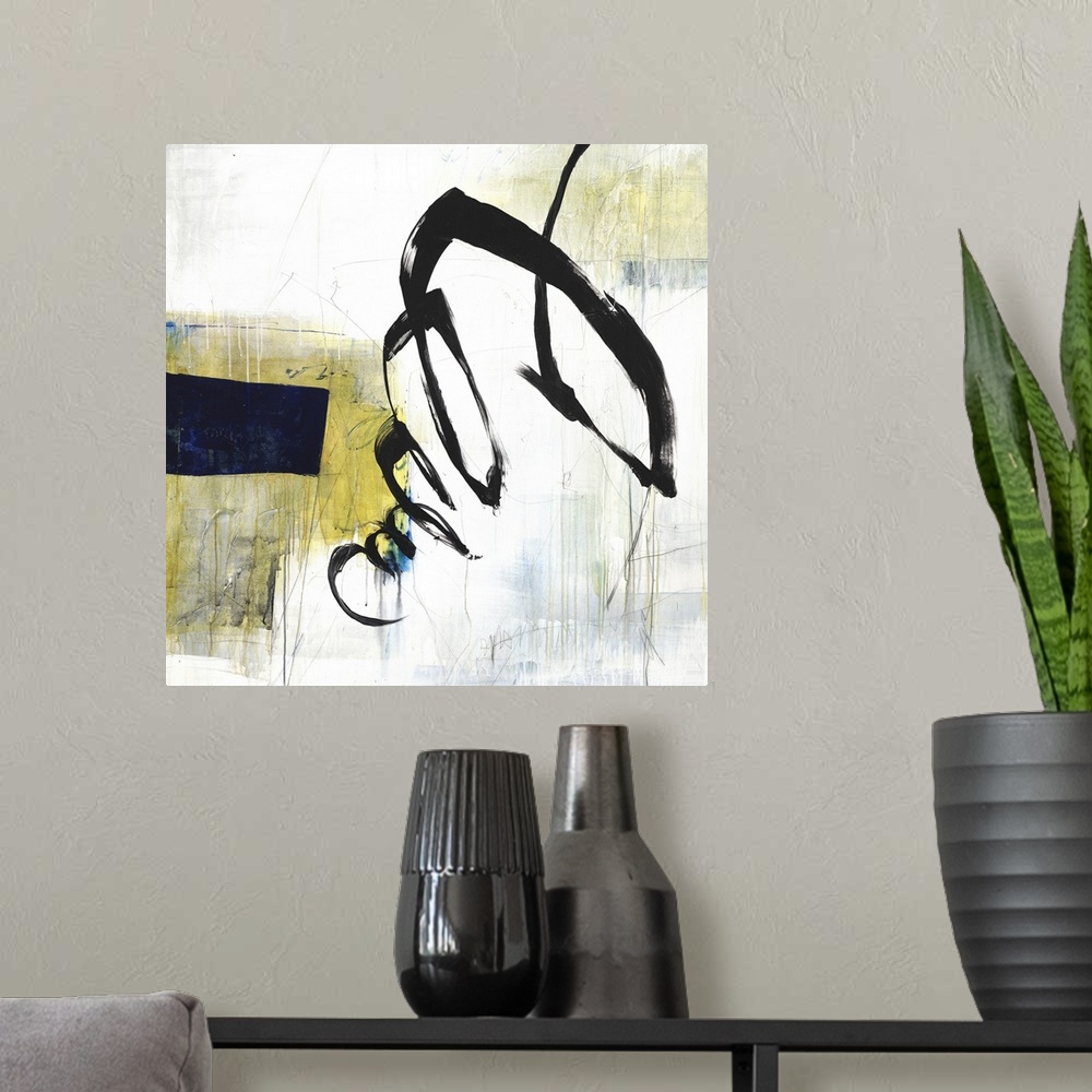 A modern room featuring Square abstract in white, gray, blue, and yellow hues with a bold black squiggly line on top.