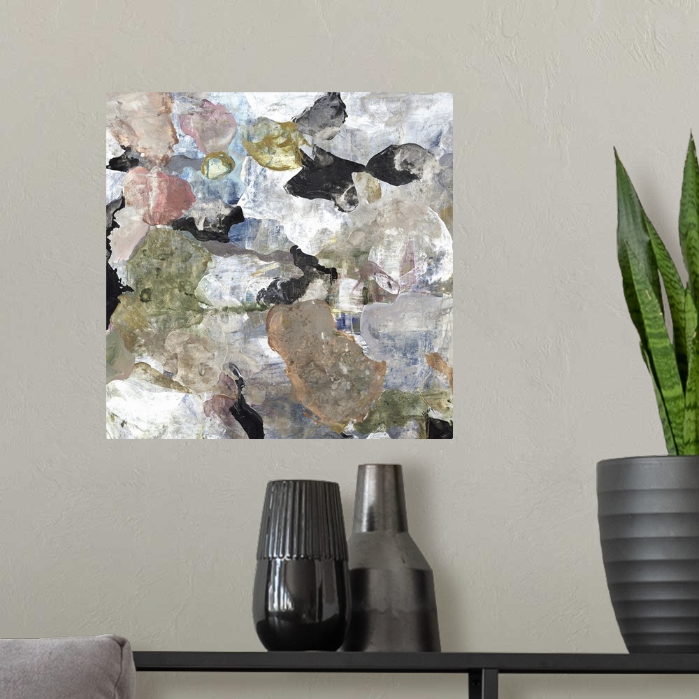 A modern room featuring A square abstract painting of rounded multi-colored shapes with a marbled effect.