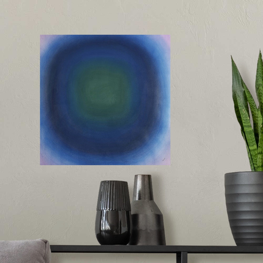 A modern room featuring Contemporary abstract painting of concentric circles in purple, green and blue.