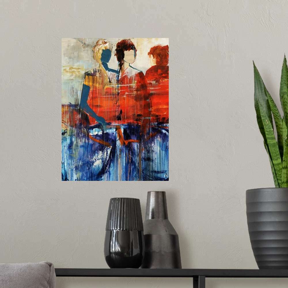 A modern room featuring Portrait, figurative art on a large wall hanging of three human figures standing behind a large o...