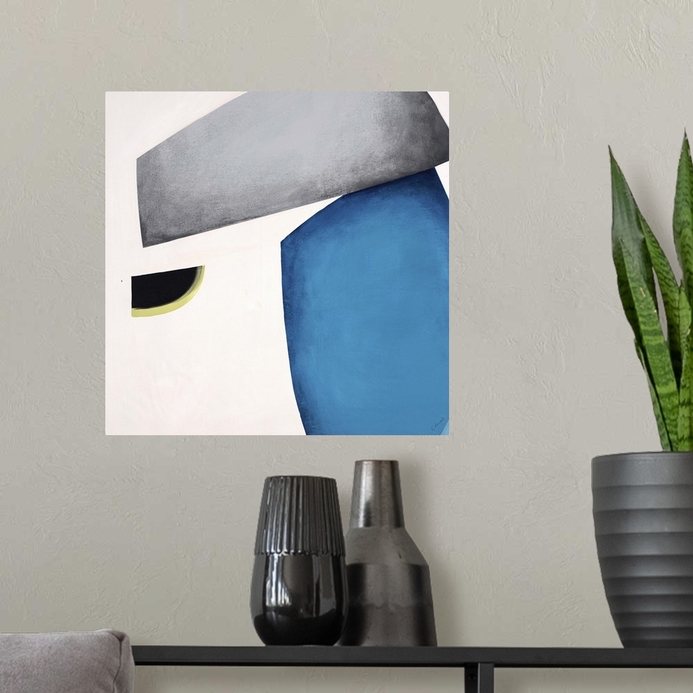 A modern room featuring Abstract painting of a portion of a space helmet on a light background.