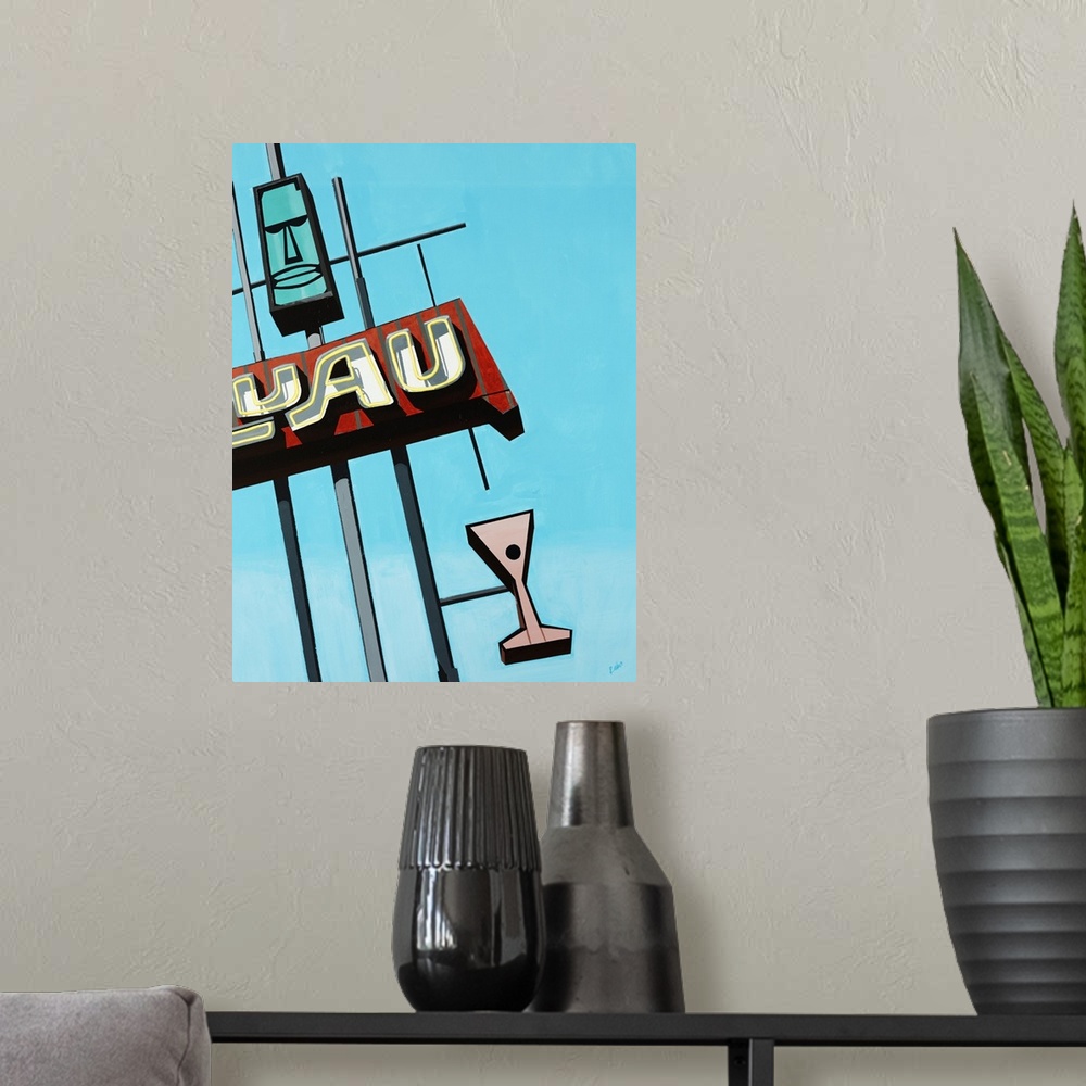 A modern room featuring Painting of a vintage luau sign that includes a tiki head and a martini glass, in front a bright ...
