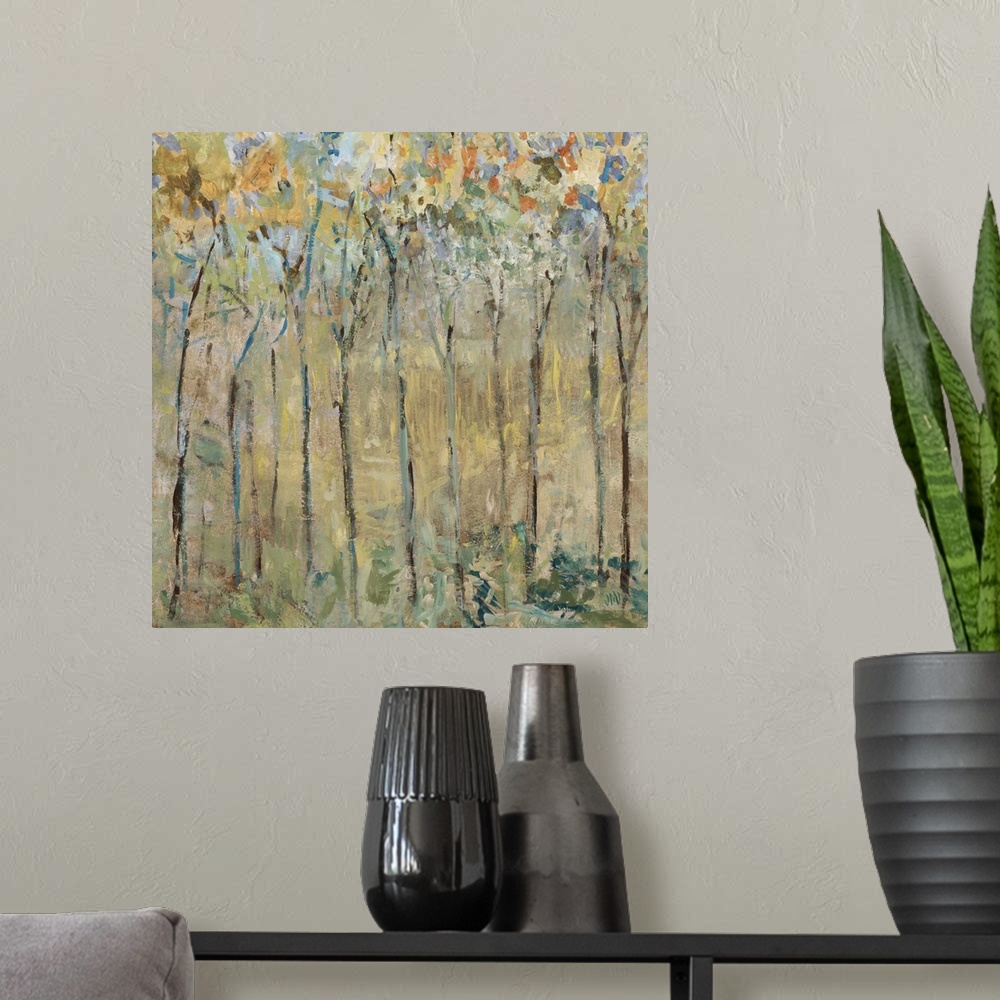A modern room featuring Contemporary artwork of a forest of thin trees with colorful leaves.