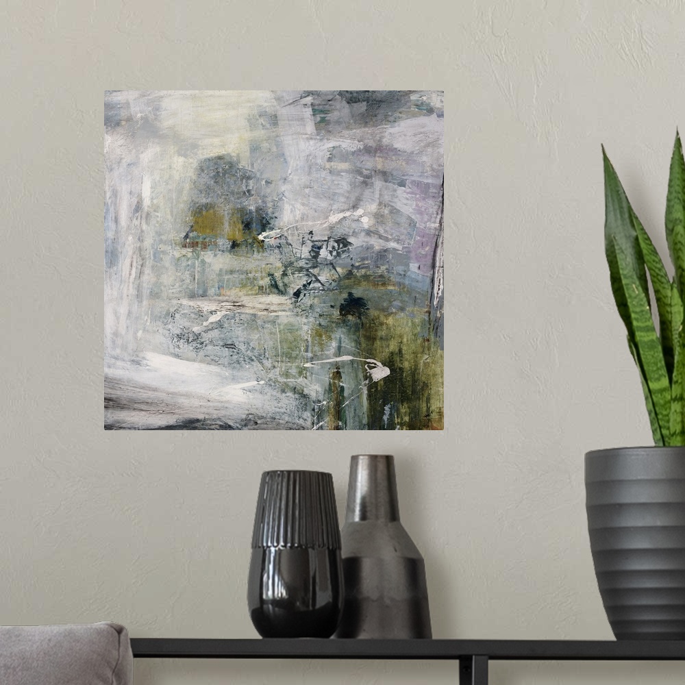 A modern room featuring Contemporary abstract painting of a variety of gray tones with hints of muted green in a distress...