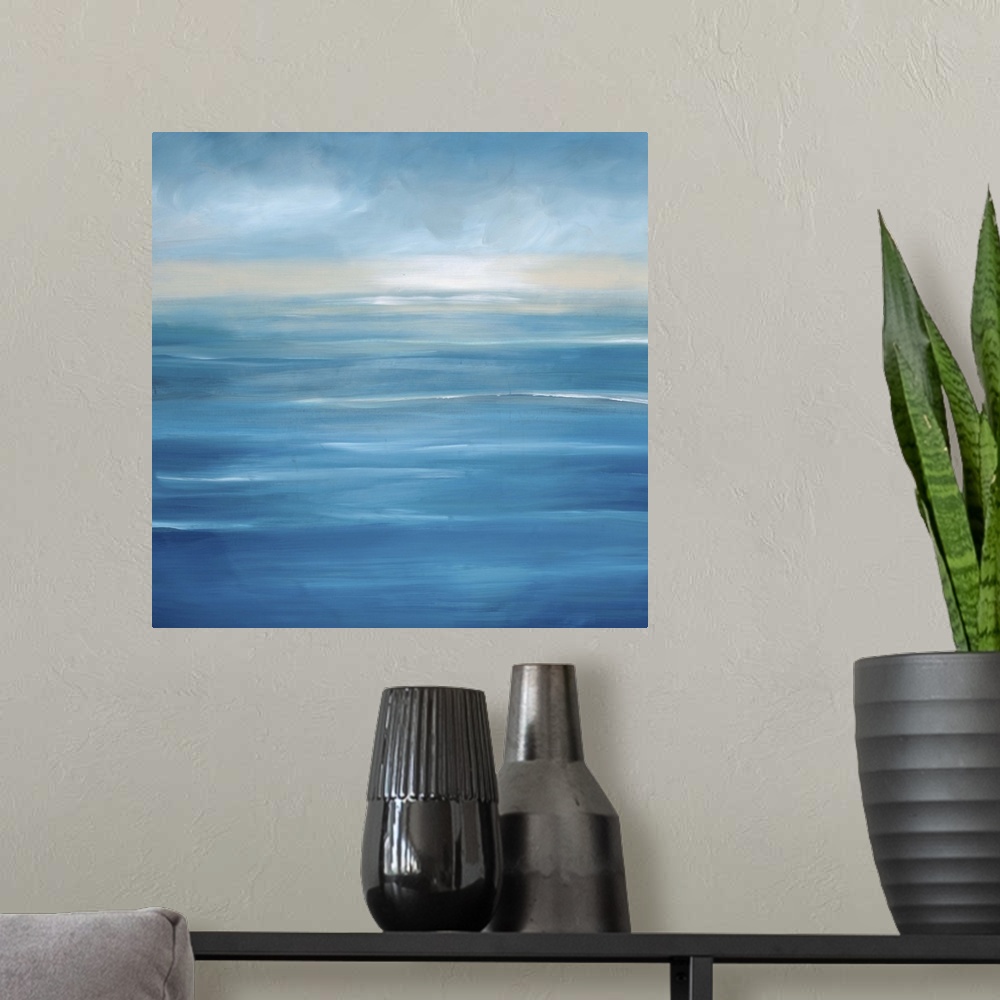 A modern room featuring Contemporary seascape painting of a cool, calm blue ocean view.