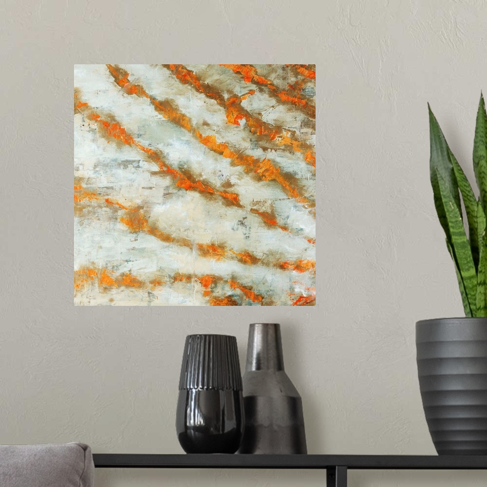 A modern room featuring Abstract painting of numerous diagonal lines in warm tones that are radiating like rays of sunlig...