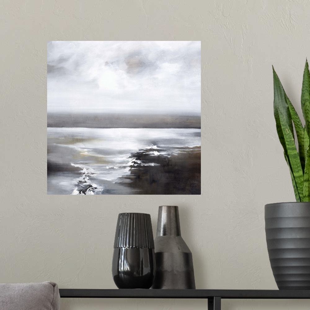 A modern room featuring Contemporary painting of a calm seascape with grey tones.
