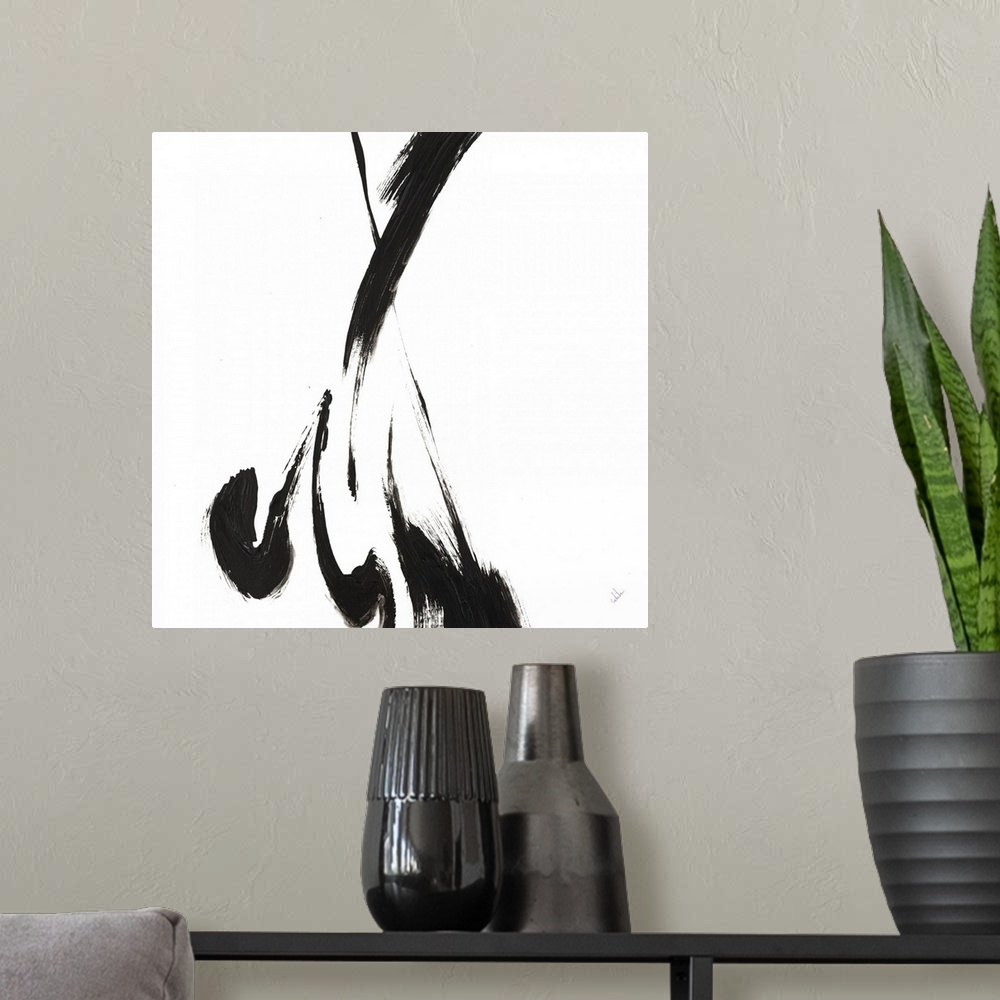 A modern room featuring Contemporary abstract art work of a few large brush strokes of black paint against white.