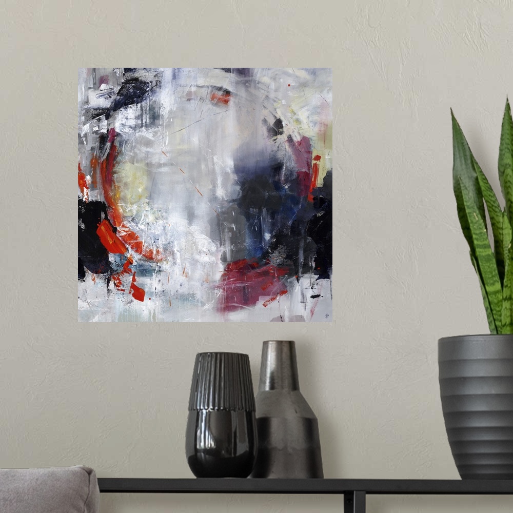 A modern room featuring Abstract painting of textured paint with a hint of a circle shape.