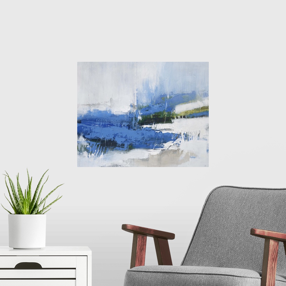 A modern room featuring Contemporary abstract artwork in deep blue and pale white tones.