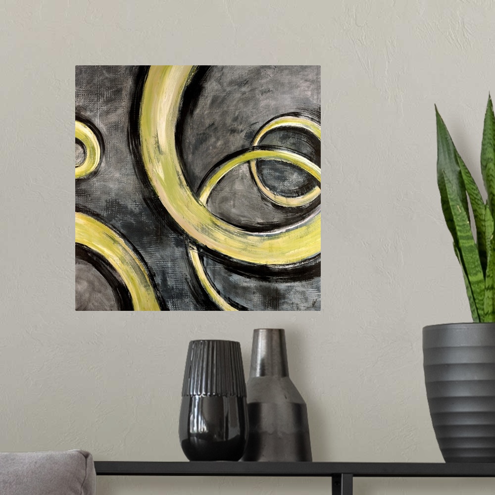 A modern room featuring Square contemporary painting of yellow swirls moving along a textured gray background, evoking a ...