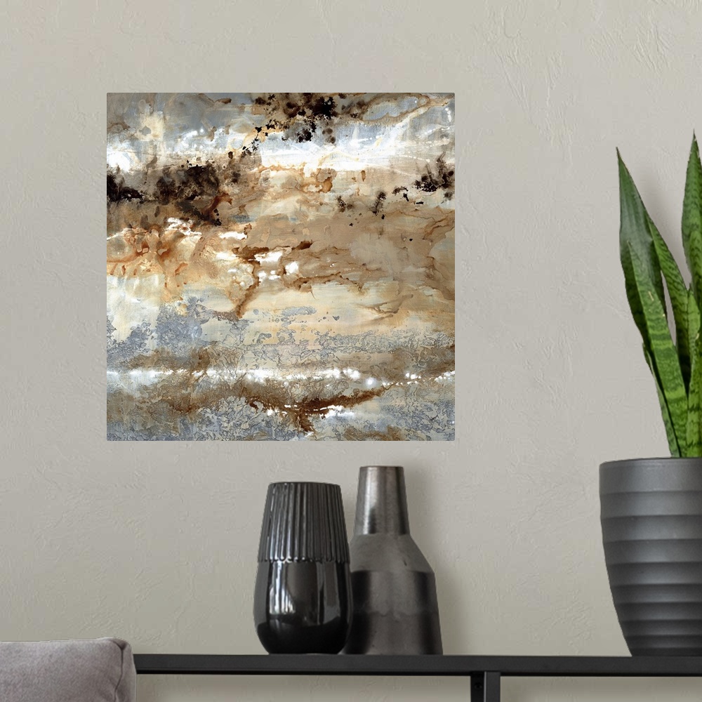 A modern room featuring Square abstract art with silver, brown, black, and white hues.