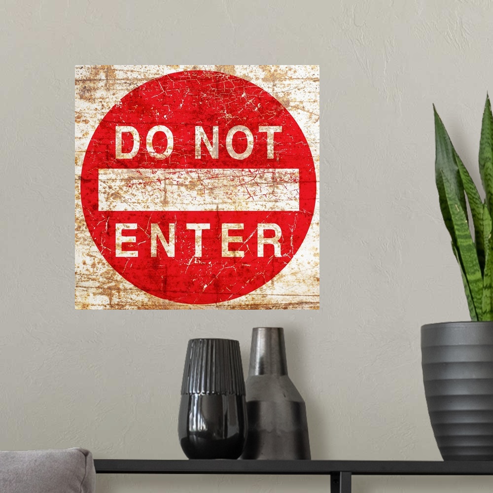 A modern room featuring A worn, distressed, cracked and rusty Do Not Enter street sign.