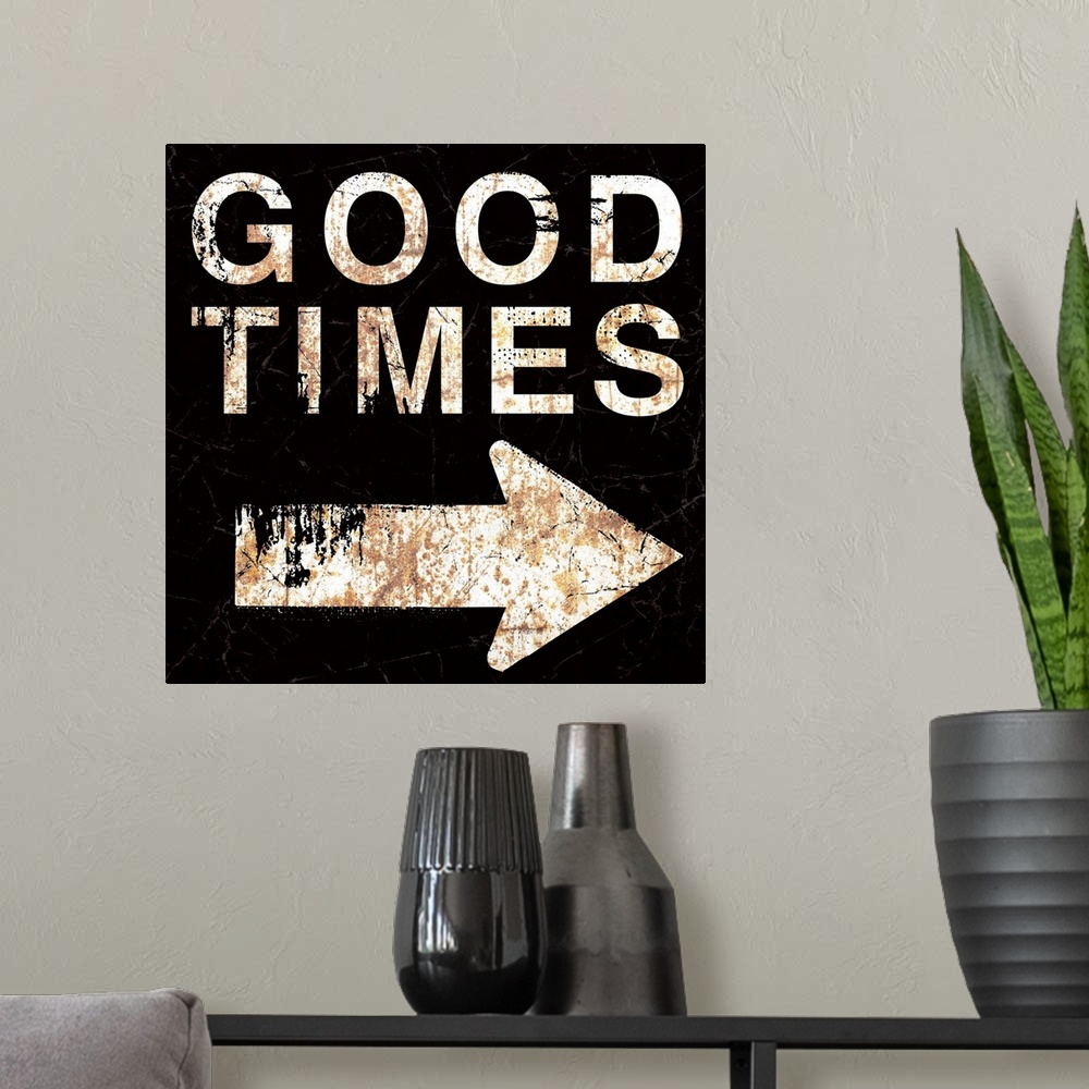 A modern room featuring A worn, distressed, cracked and rusty Good Times street sign.