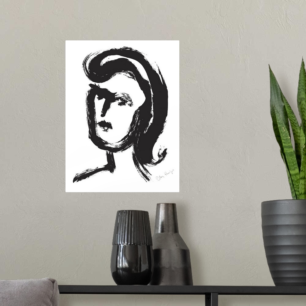 A modern room featuring A quick black brush illustration of a young woman's face.