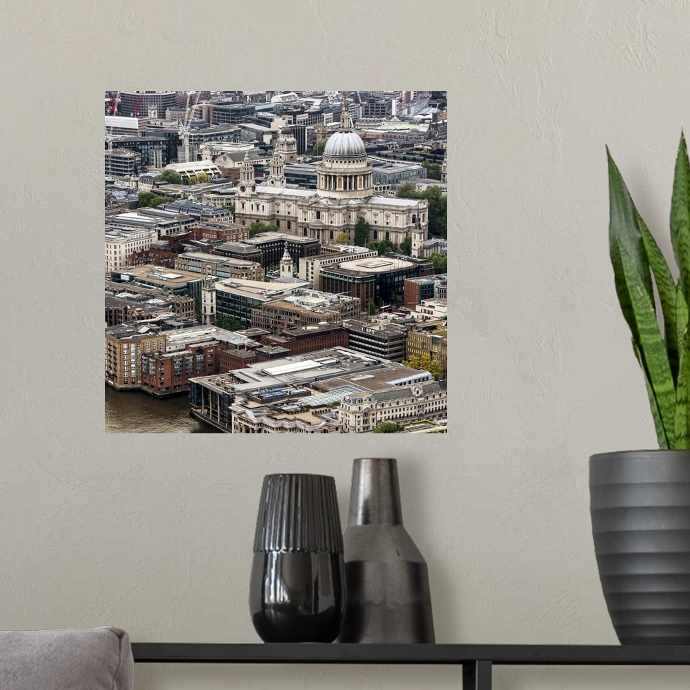 A modern room featuring View from above of the London cityscape, including St Paul's Cathedral.