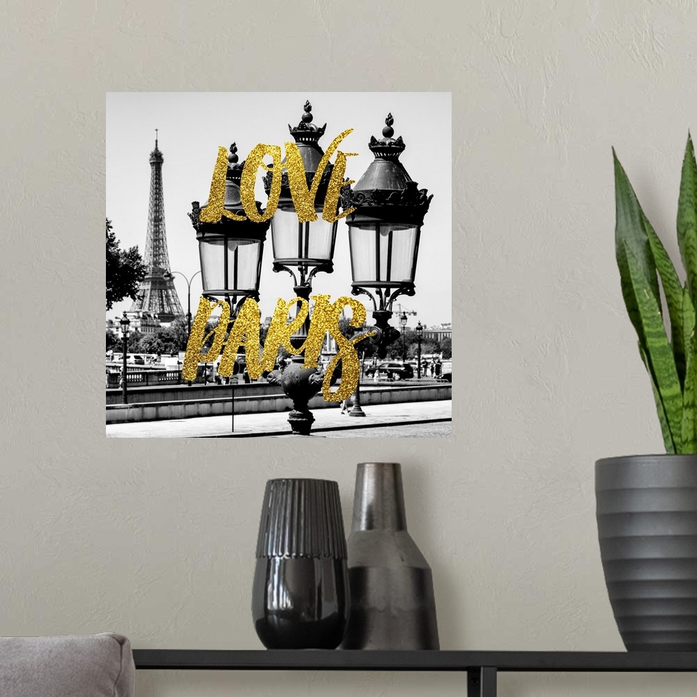 A modern room featuring Black and white photograph of a lamppost with the Eiffel Tower in the background and the phrase "...