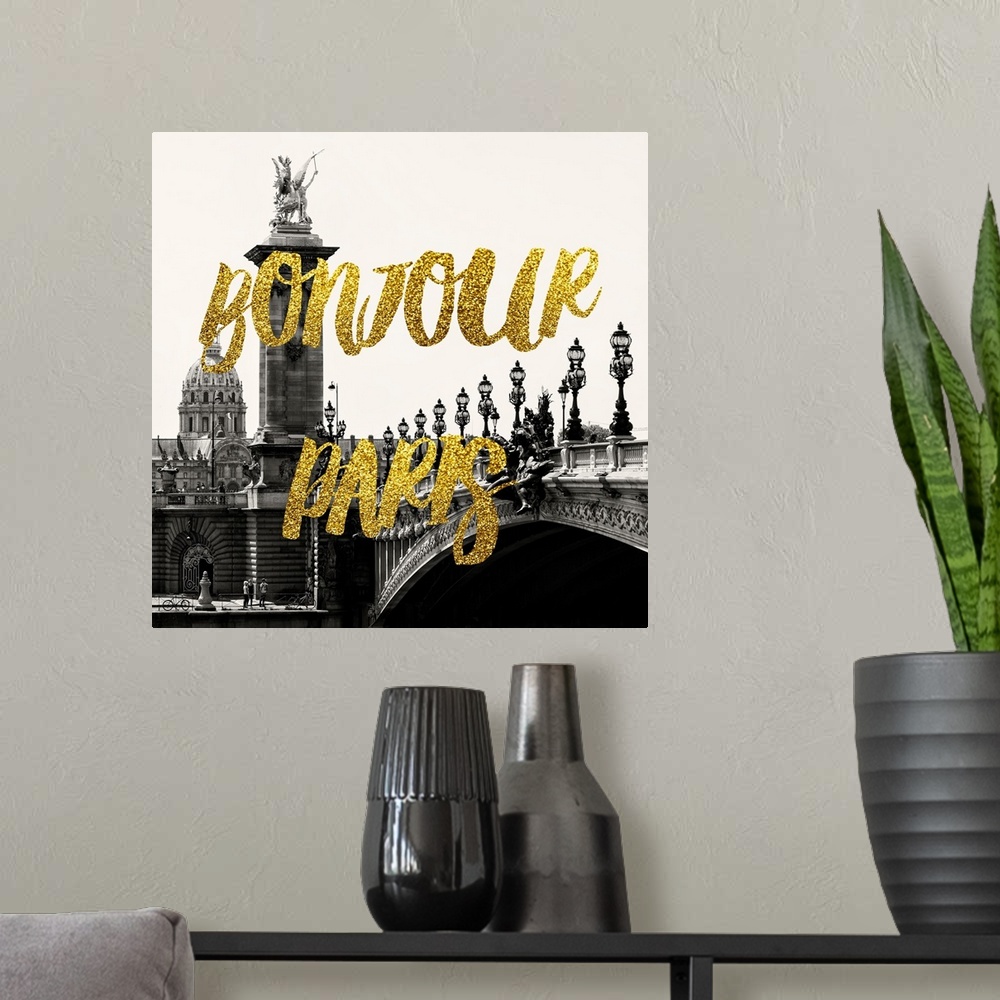 A modern room featuring Black and white photograph of the Pont Alexandre III with the phrase "Bonjour Paris" written in g...
