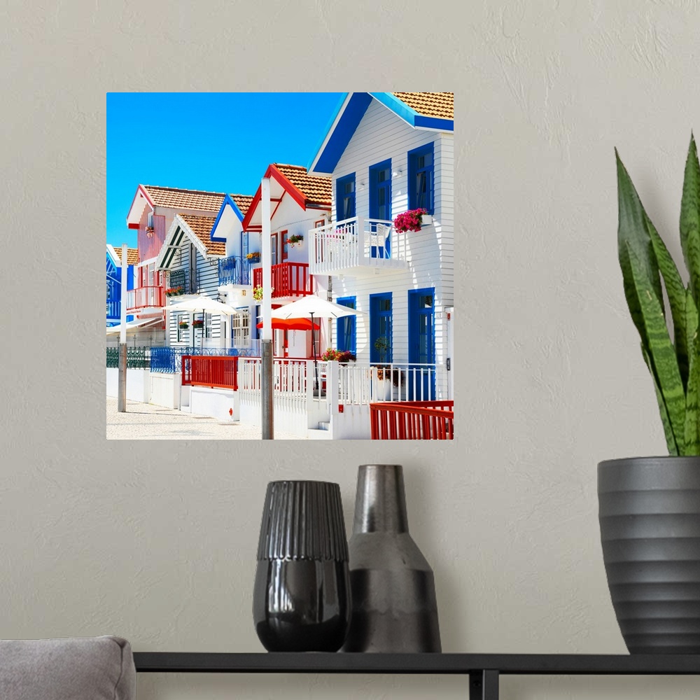 A modern room featuring These are colorful white houses with stripes in Costa Nova Beach, Portugal.