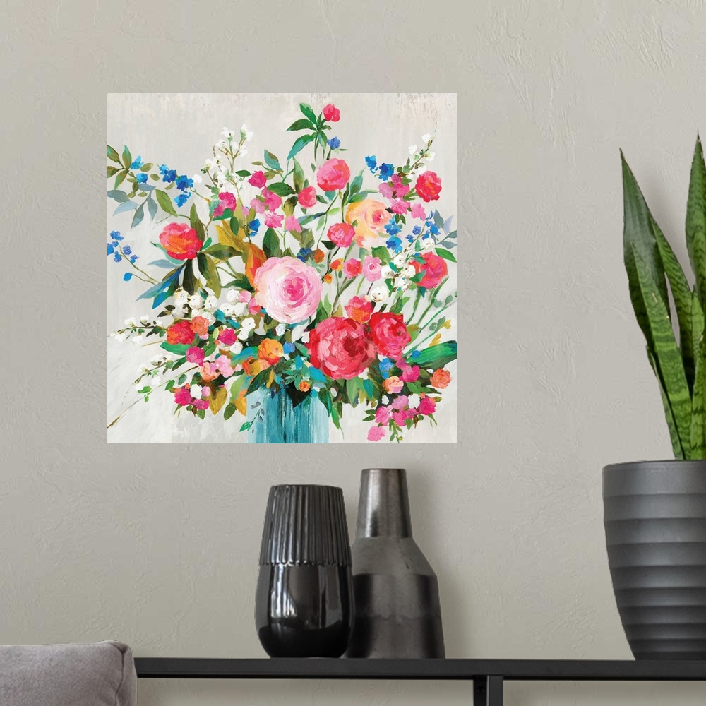 A modern room featuring A square painting of bright flowers in a vase against a gray backdrop.
