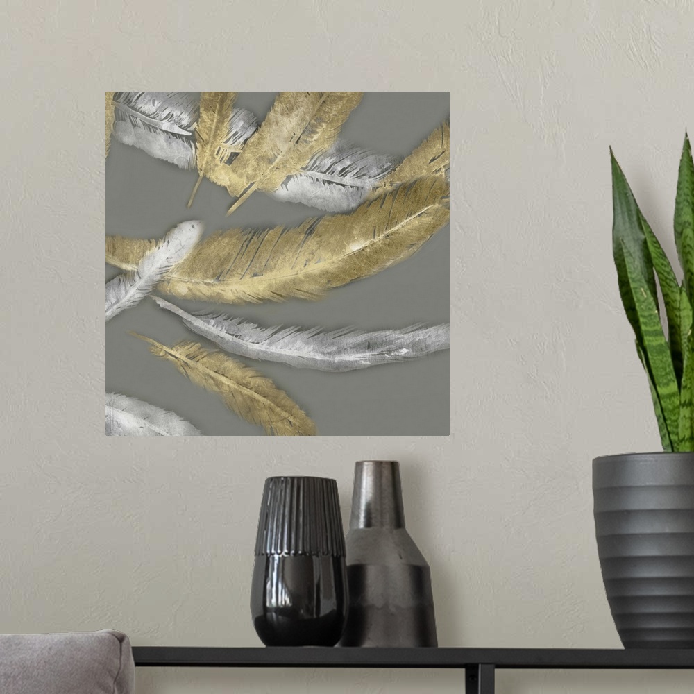 A modern room featuring Contemporary home decor artwork of gold and silver feathers fluttering against a gray background.