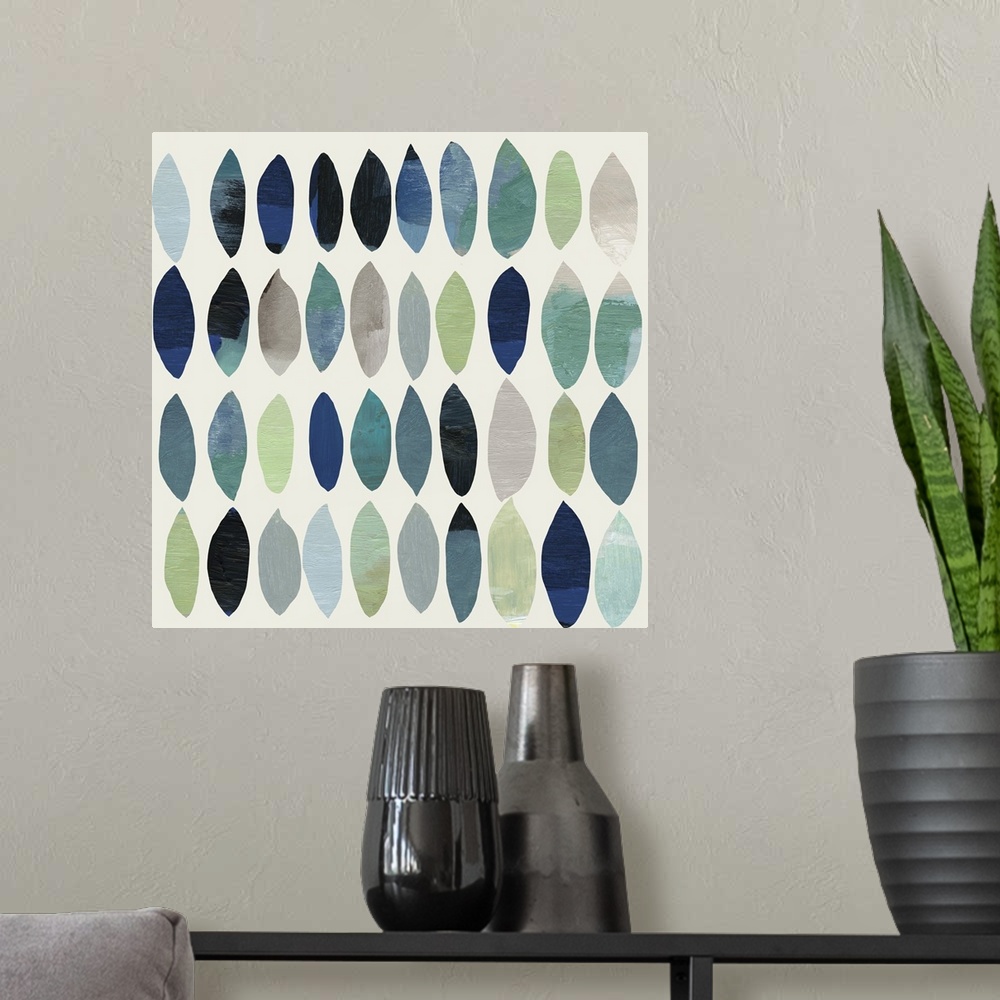 A modern room featuring Abstract painting of leafs in shades of blue and green.