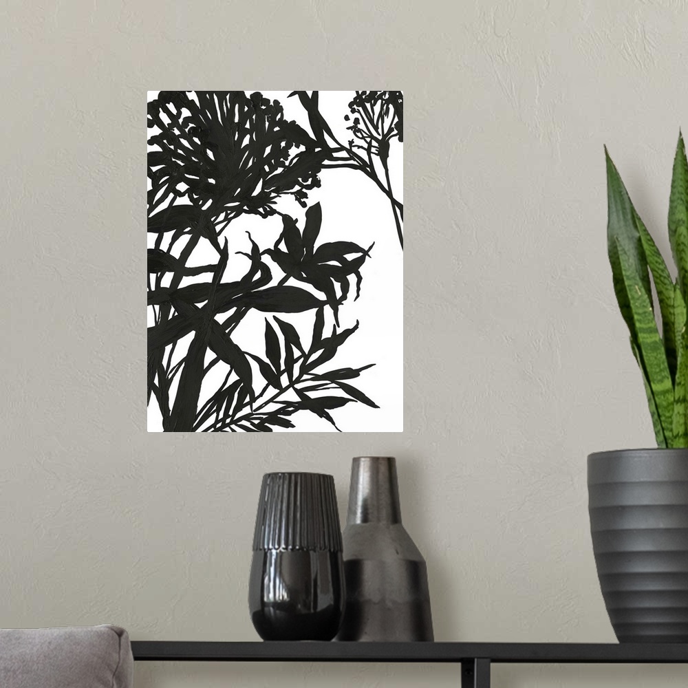 A modern room featuring Vertical painting of a flower arrangement in black and white.
