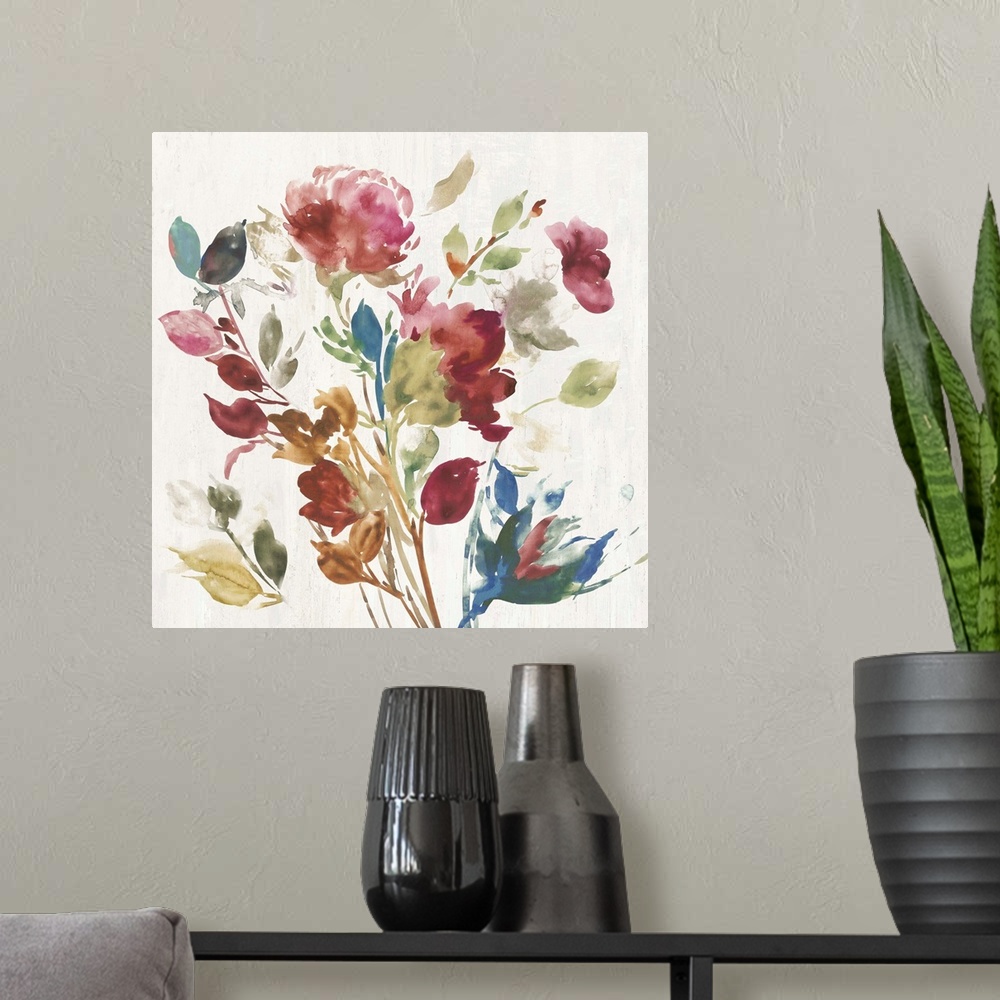 A modern room featuring Watercolor artwork of pink, green, and blue flowers over a cream colored background.