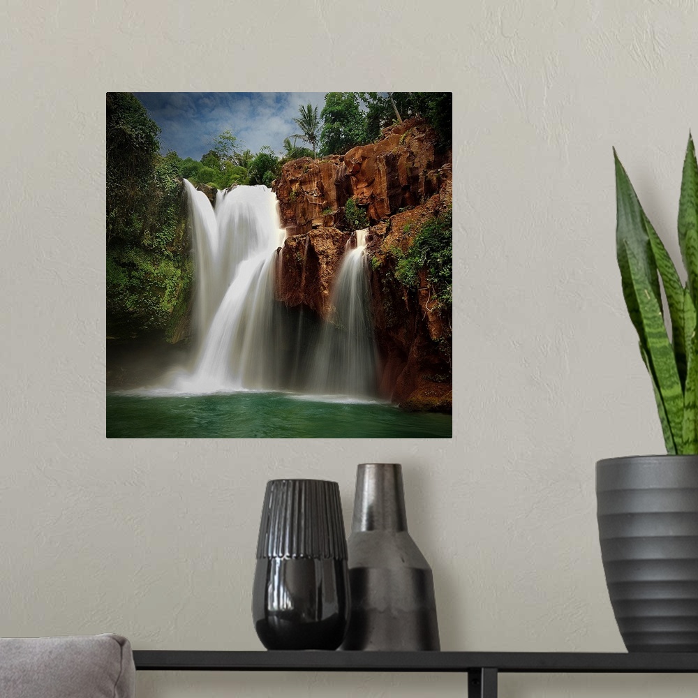 A modern room featuring Tegenungan Waterfalls
