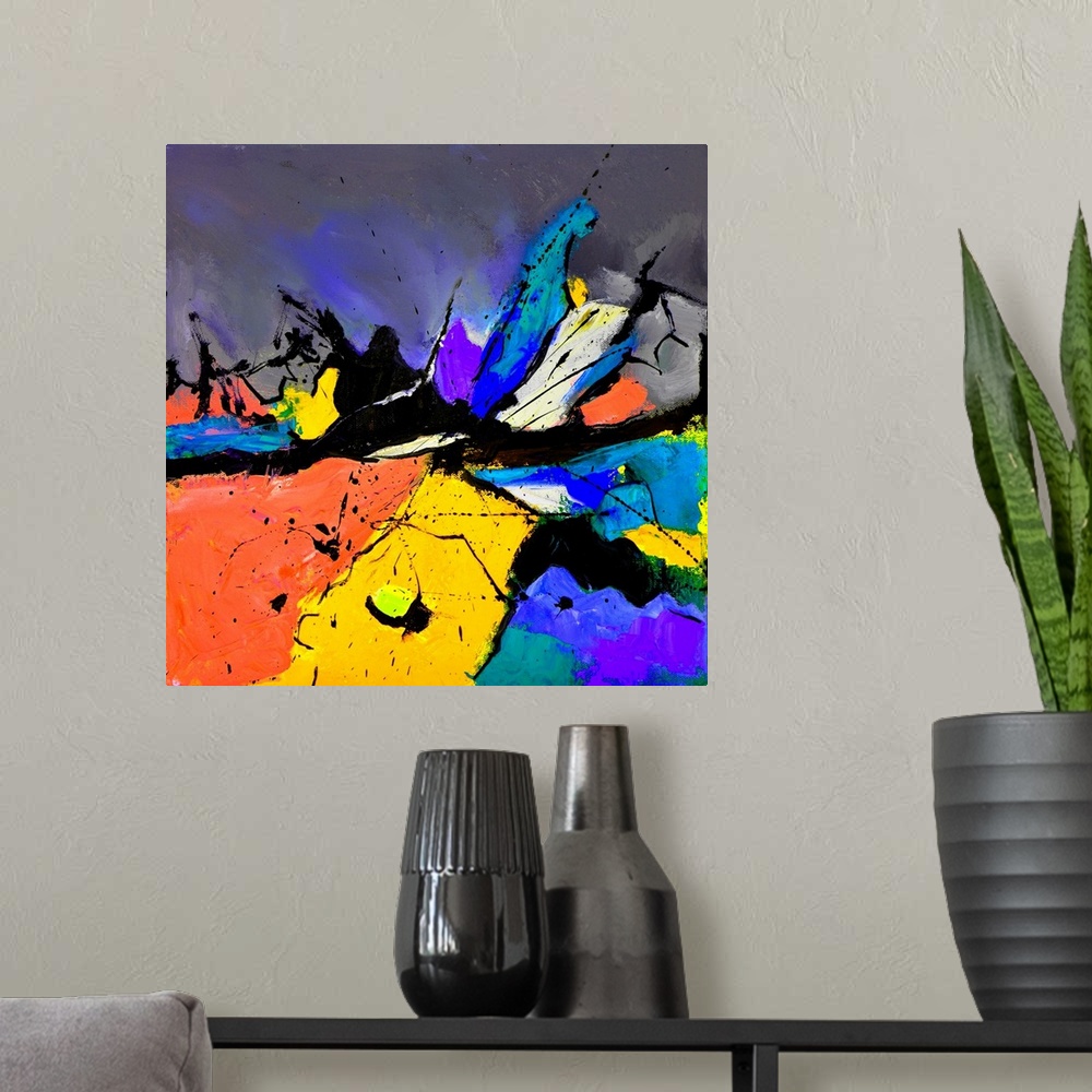 A modern room featuring A square abstract painting in vibrant shades of orange, blue, purple and yellow with splatters of...