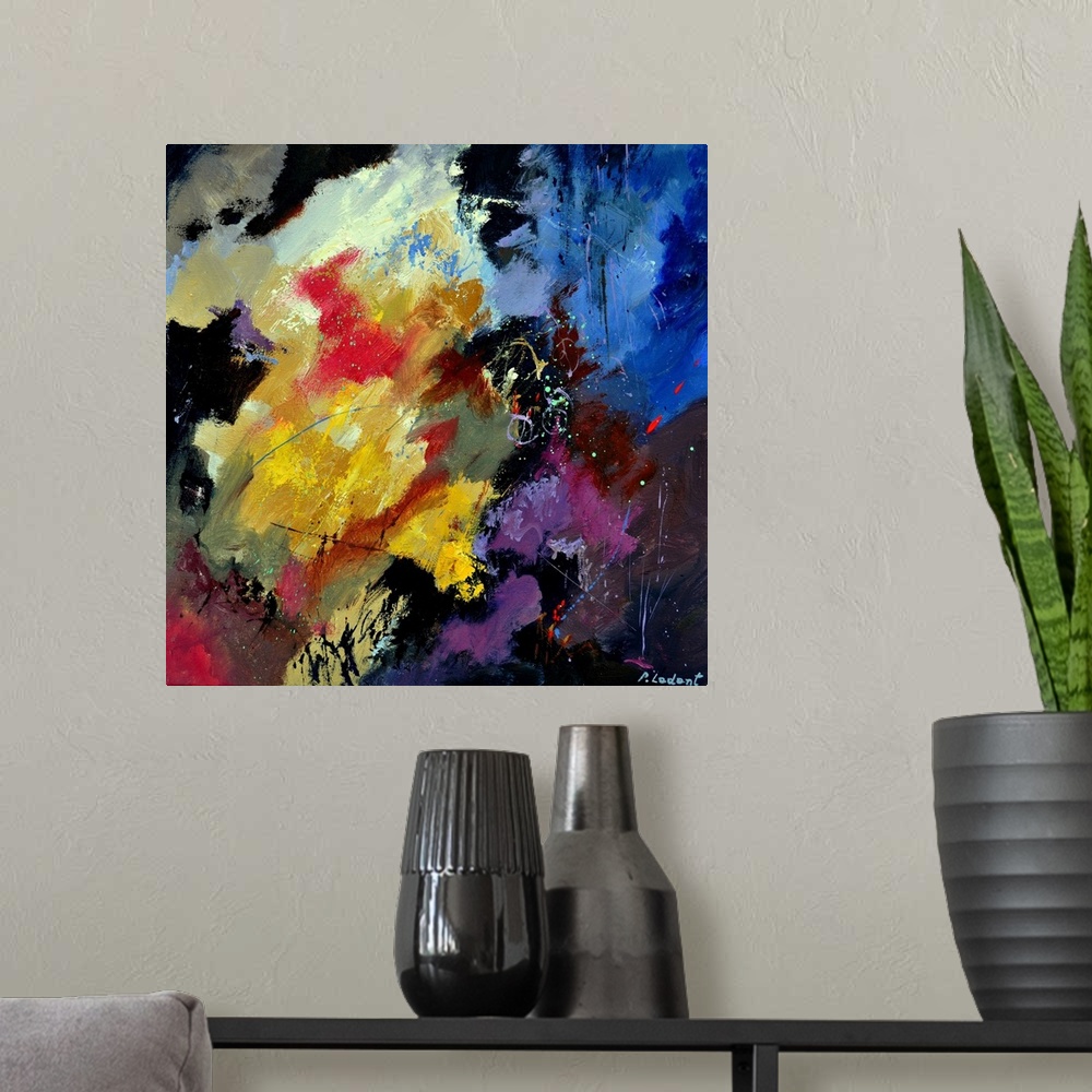 A modern room featuring Abstract painting with vibrant hues in shades of orange, yellow, blue, purple, and white mixed in...