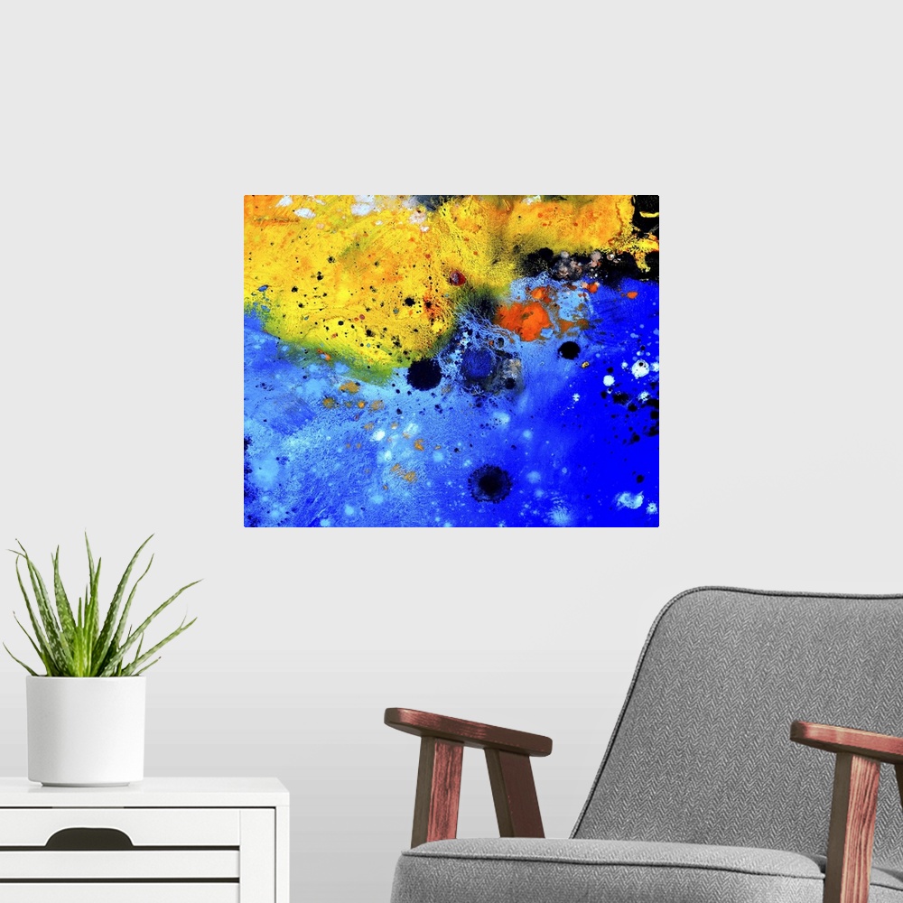 A modern room featuring Abstract painting of colors of blue, black and yellow with hints of red in textured brush strokes...