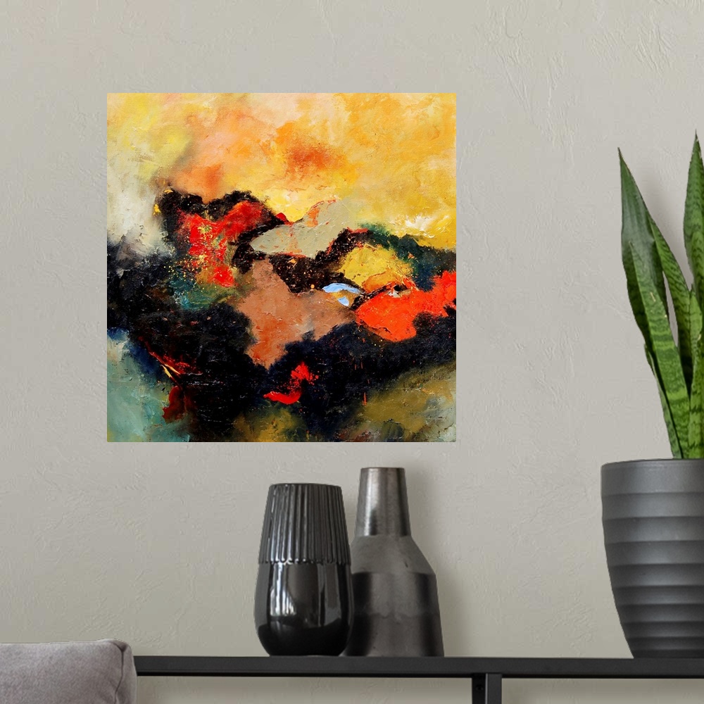 A modern room featuring A square abstract landscape with vivid colors of yellow and orange.