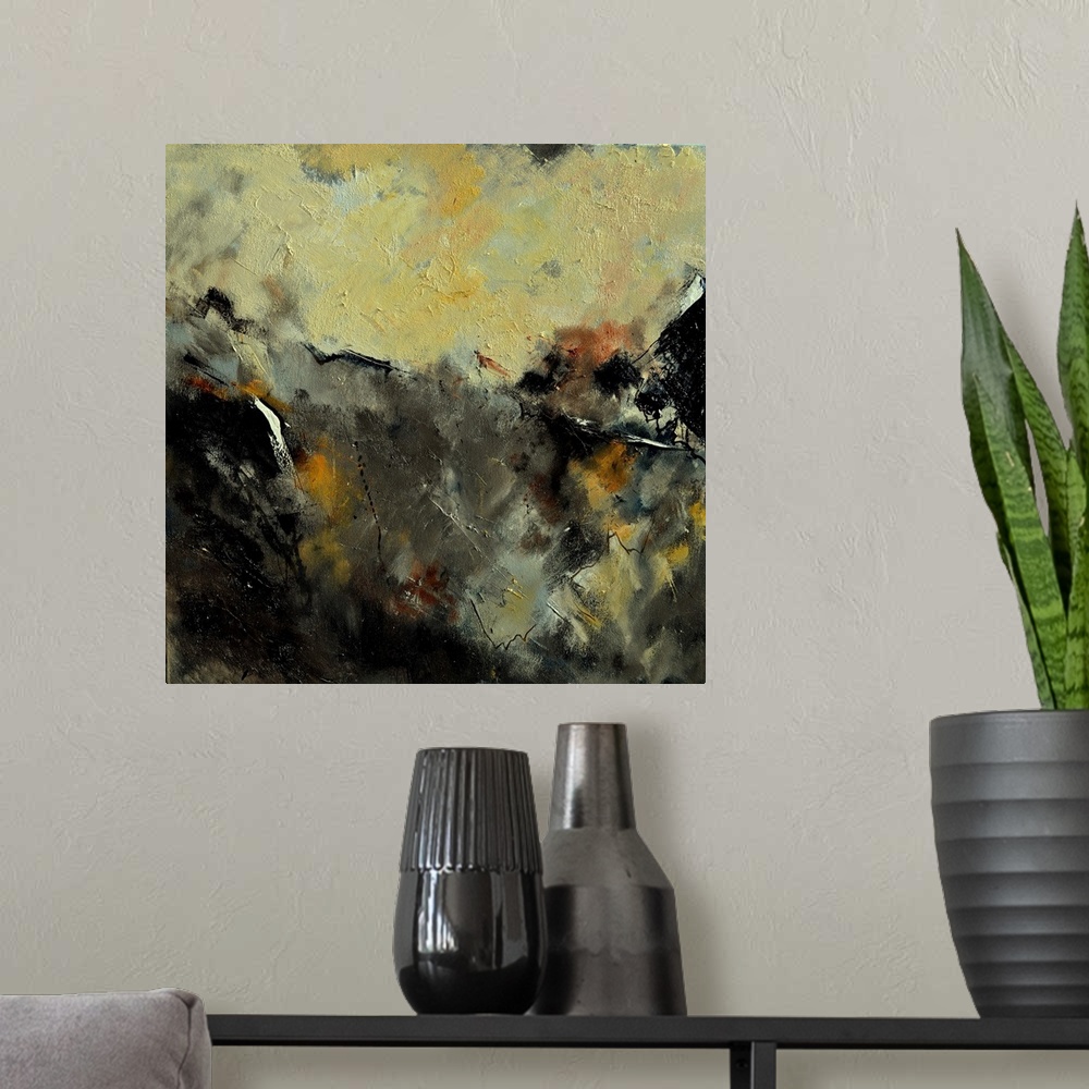 A modern room featuring A square abstract painting in dark shades of black, brown, white and yellow with splatters of pai...