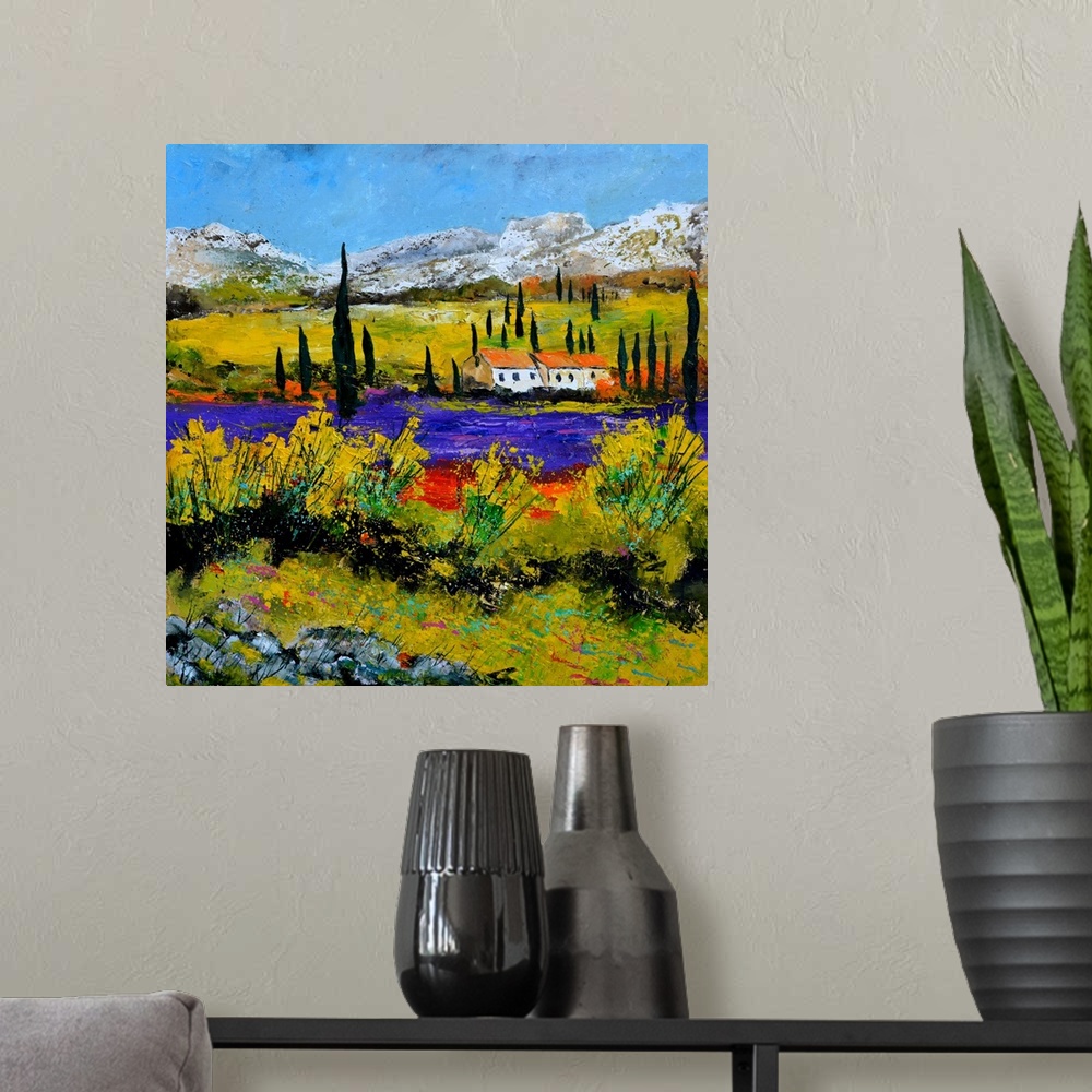 A modern room featuring Vibrant painting of a bright Summer day with a house next to a river and mountains in the distance.