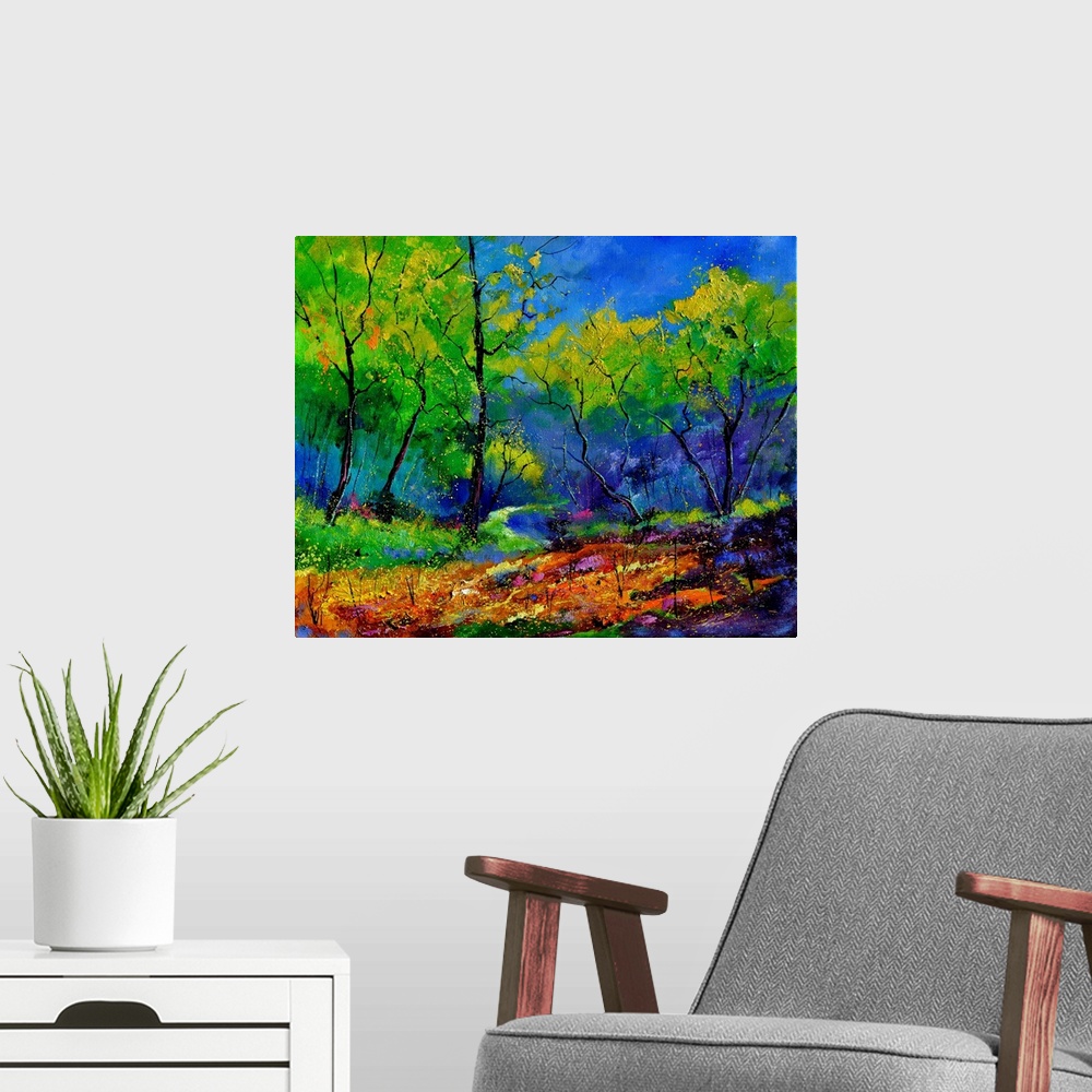 A modern room featuring Vibrant painting of a colorful path through a forest of green leaved trees and a bright blue sky.