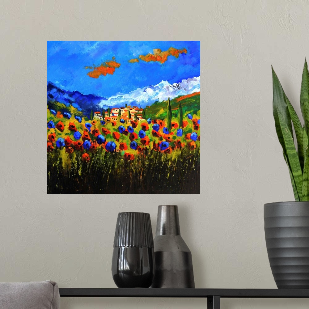 A modern room featuring Vibrant painting of a bright Summer day with blossoming poppies, a colorful sky, and the village ...
