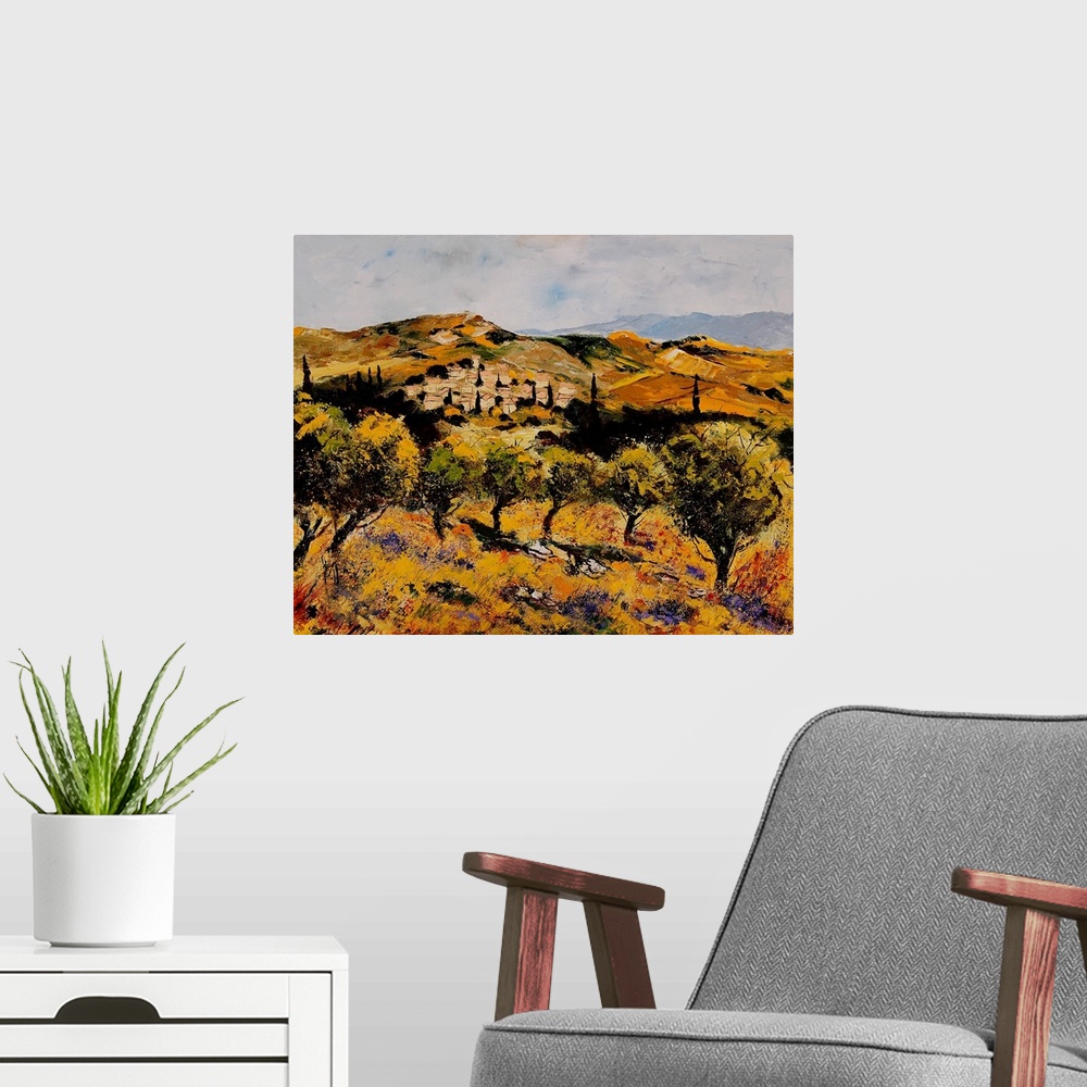 A modern room featuring A horizontal abstract landscape of a village with muted textured colors of brown, orange and yellow.