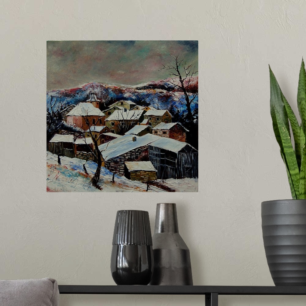 A modern room featuring A vertical painting of a snow over village of Laforet, Belgium.