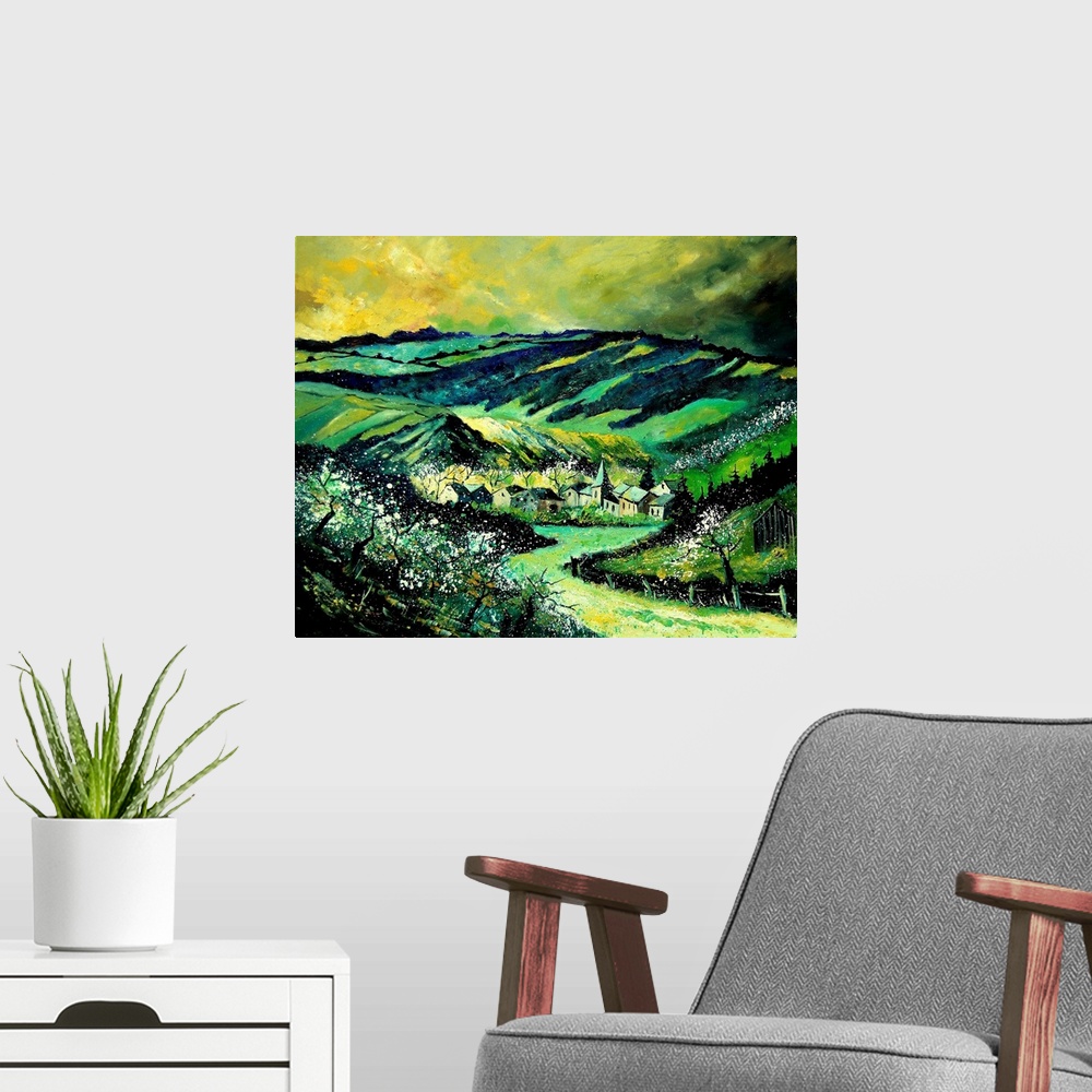 A modern room featuring A horizontal painting in vibrant colors of green of the village of Ardennes, Belgium.