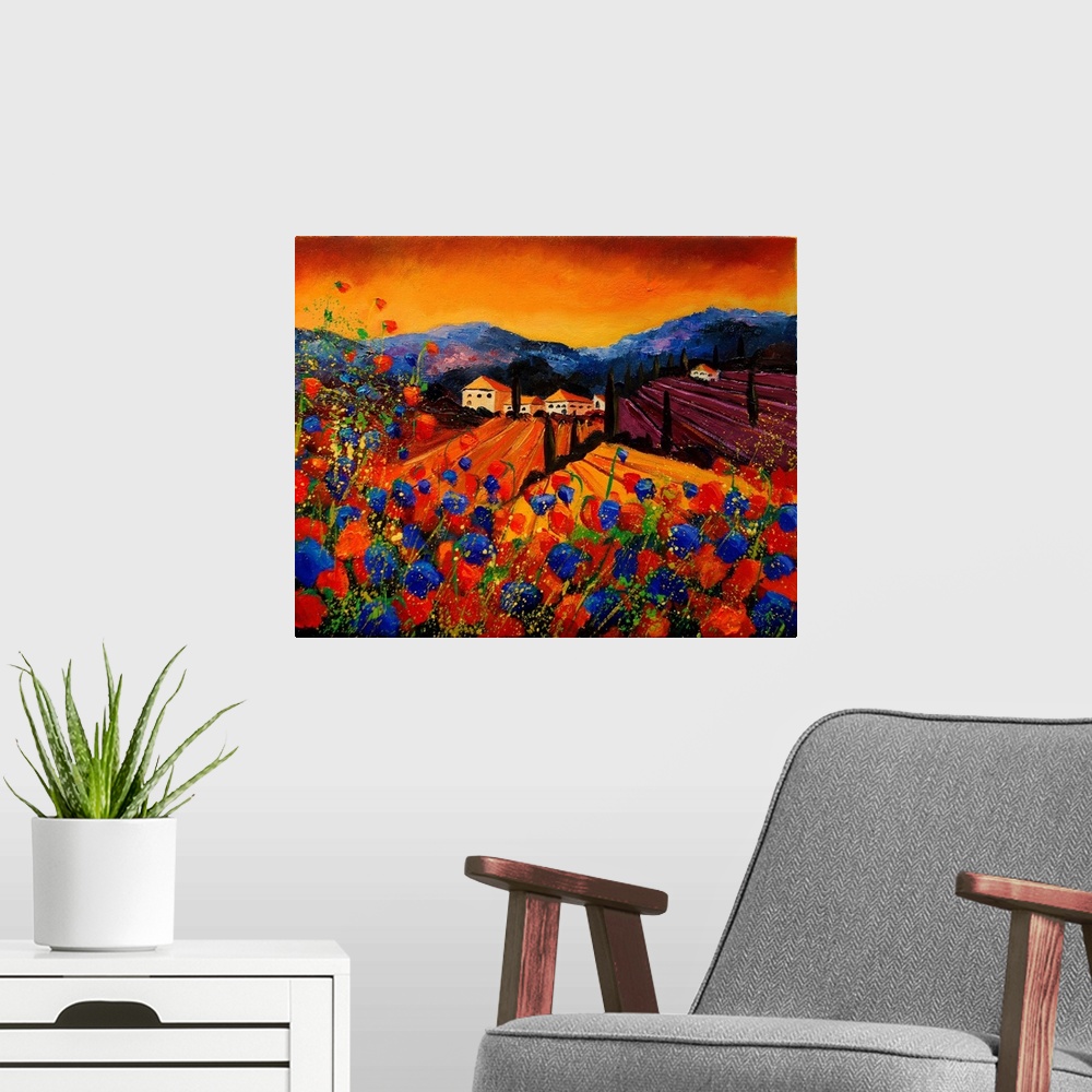 A modern room featuring Square painting of a vibrant landscape with red and blue poppies in the foreground and a bright w...