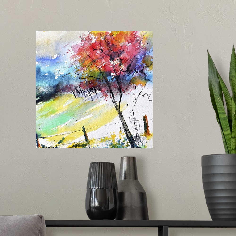 A modern room featuring A square watercolor landscape of a tree in autumn colors.